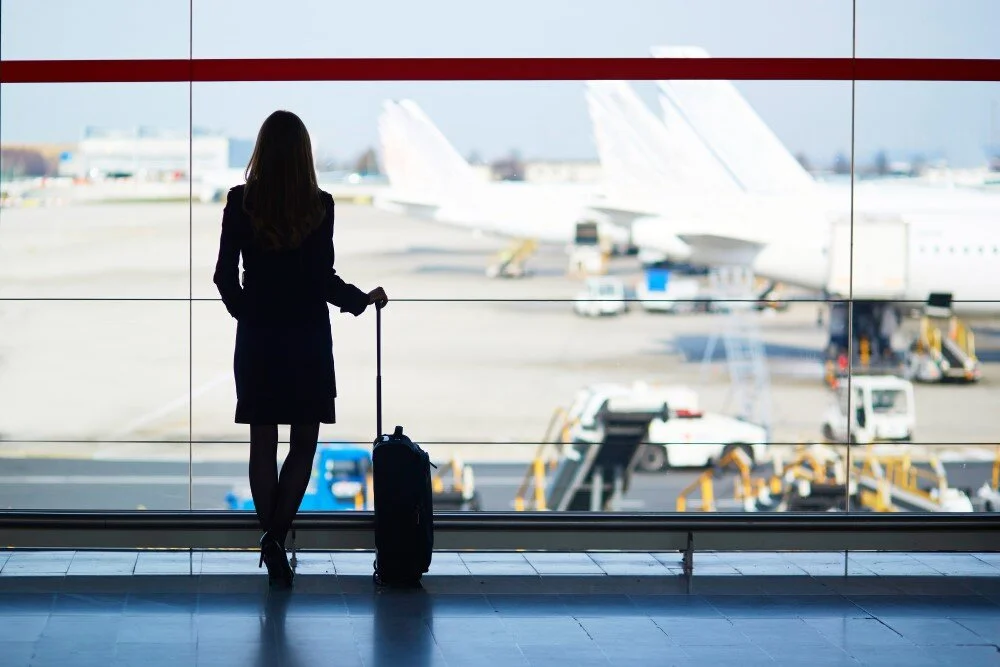 Woman looking at airplanes